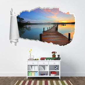 Passerelle au-dessus du coucher du soleil d’eau 3D trou de papier déchiré autocollant de mur déchiré d’effet